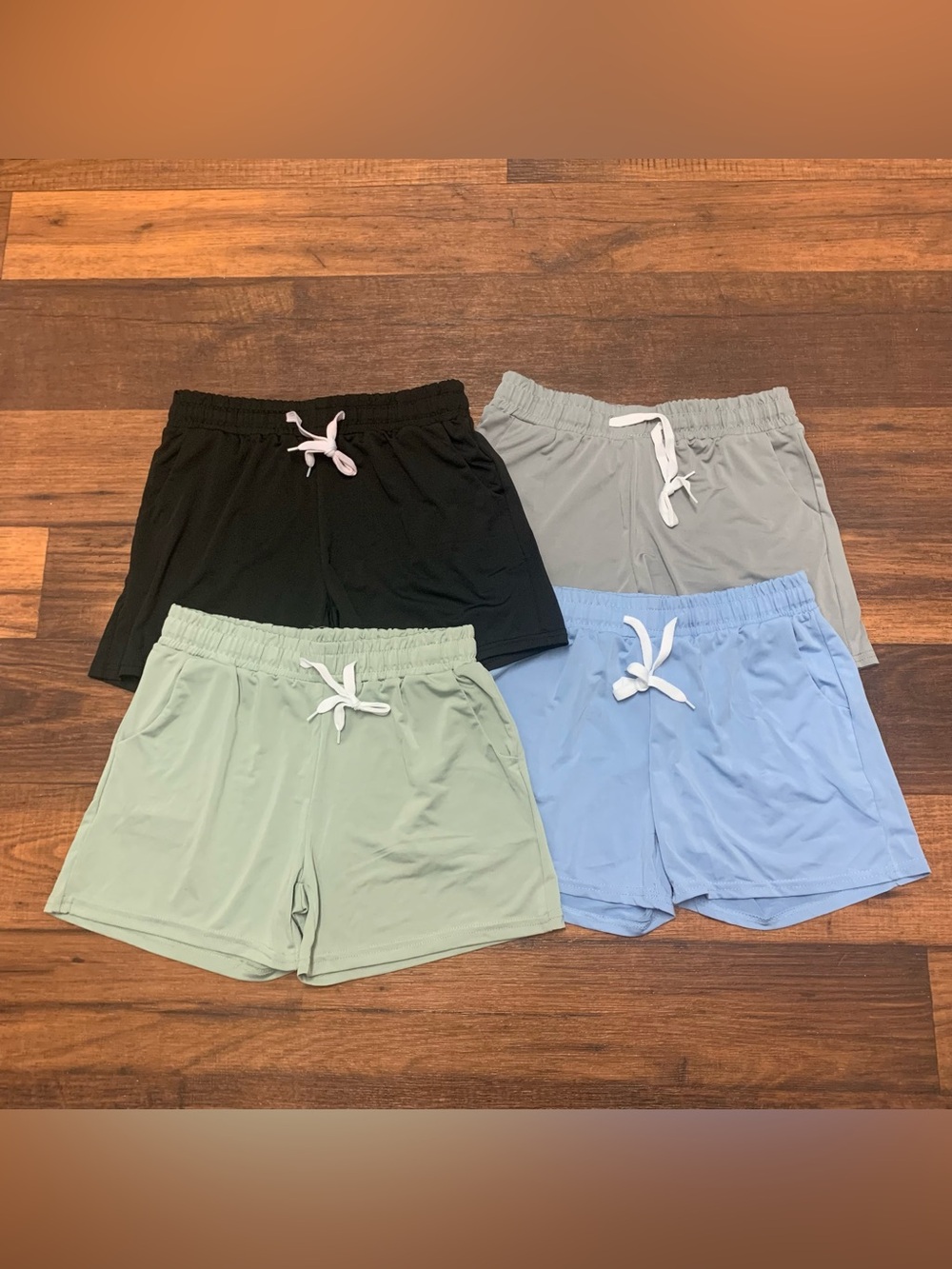Real Essentials 4 Pack: Girls Athletic Performance Dry-Fit Running Shorts Sz M